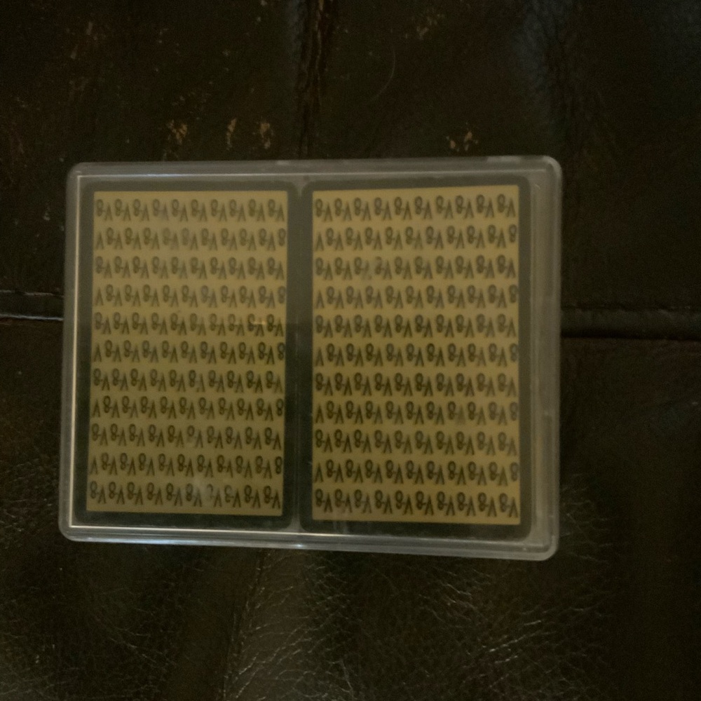 Playing Cards with Black and Gold Design